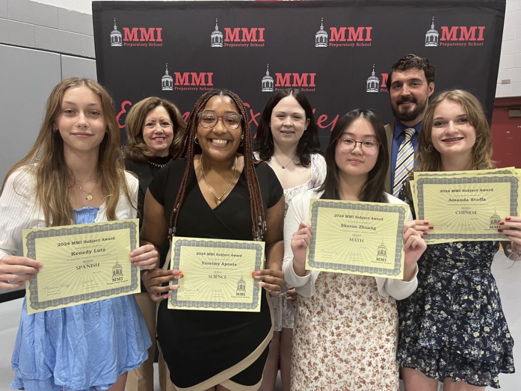 The ninth-grade subject award winners were: (first row, L-R) Kenedy Lutz (Spanish), Yoreimy Aponte (Science), Sharon Zhuang (Math), Amanda Stoffa (Chinese, English, History, and Visual Arts), (second row) Head of School Theresa Long, Christina Chrin (Performing Arts), and Academic Dean Justin Vincent.