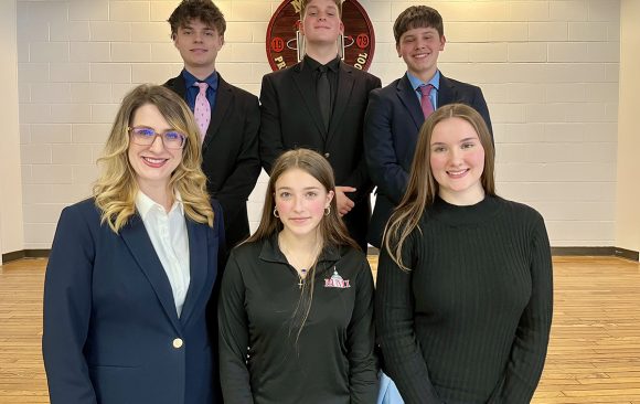 Best of the Best competitors stand with their Advisor Mrs. Katherine Zucco (front left). First row: Marissa Yamulla (center) and Maia Laverty (right). Second Row (left to right): Gabe Horvath, Ian Composto, and Philip Benyo. Caleb Skuba was missing from the picture.